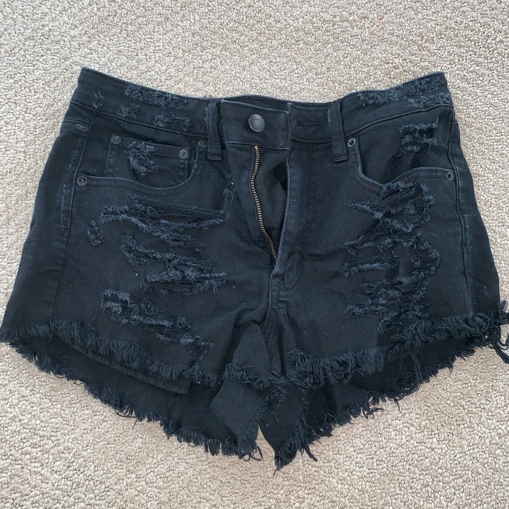 black ripped jean shorts